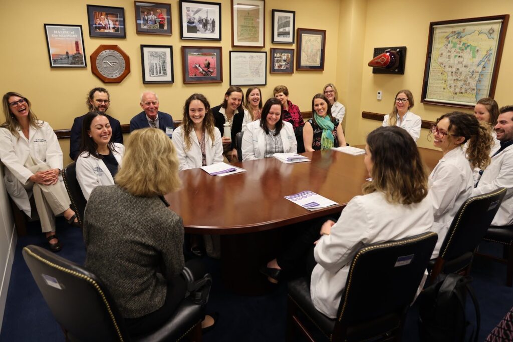 Kirstin Lyerly (left) meets with Sen. Tammy Baldwin to discuss health care and abortion in Wisconsin
